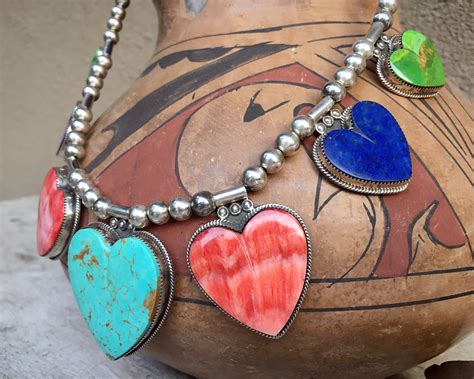 aquin heart jewelry.